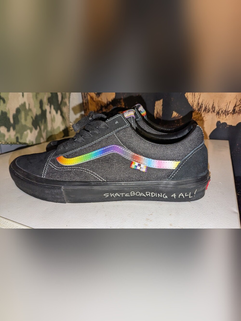 Vans Black Low-Top Sneaker with Rainbow Side Stripe